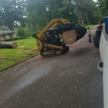 equipment moving large log